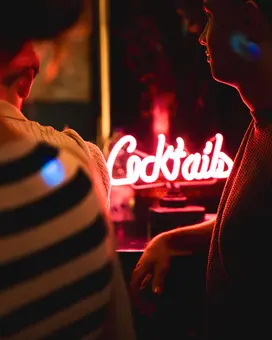 A vibrant neon sign reading