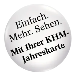 A circular badge featuring the text: