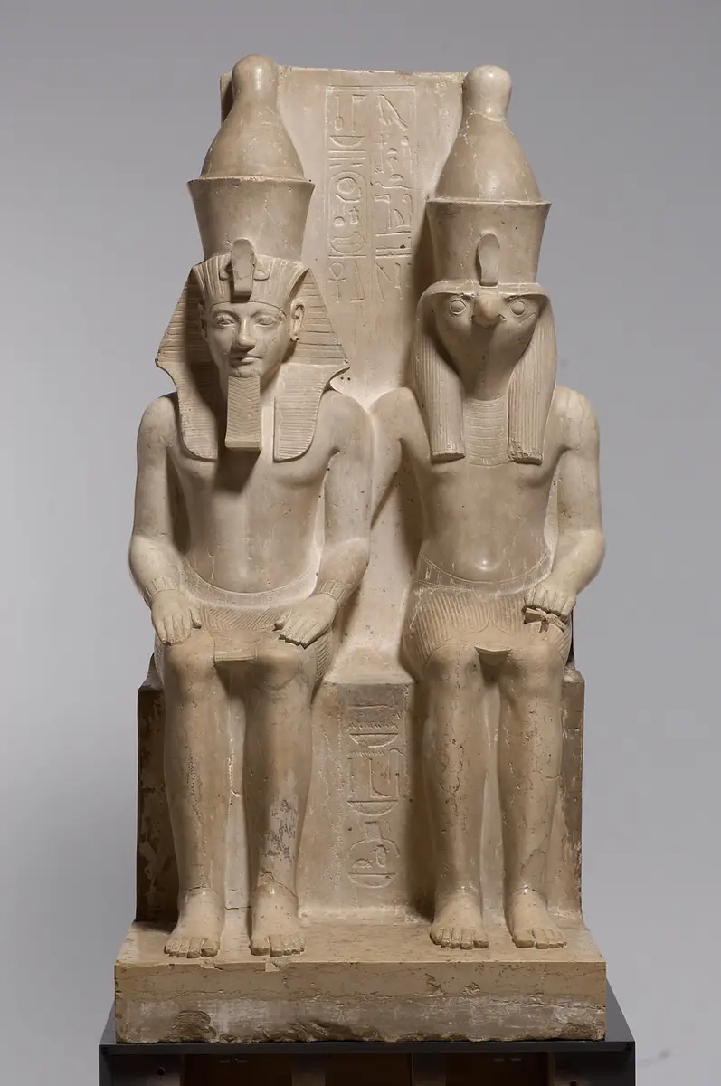 Statue group of the god Horus and King Haremhab
