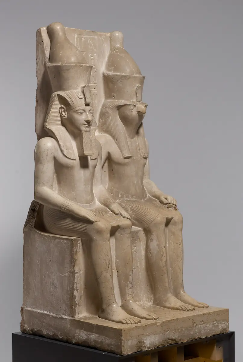 Statue group of the god Horus and King Haremhab